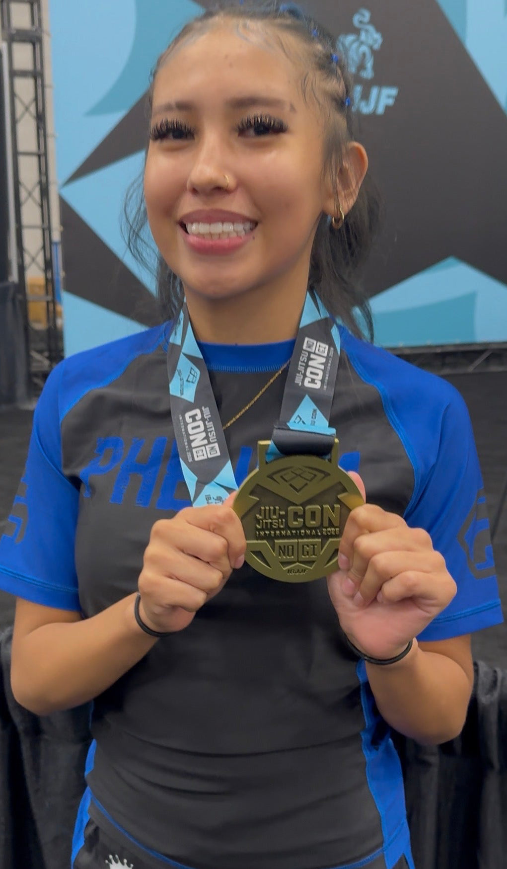 PHENOM Ava Tiny Gomez Sponsorship Options Athlete Sponsorship in black and blue, front product view