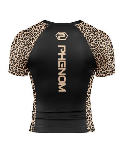Black short-sleeve athletic rash guard with leopard print sleeves and side panels, featuring vertical 'PHENOM' branding on the back.