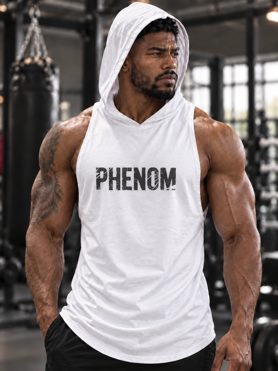 A muscular man in a gym wearing a white sleeveless hooded tank top with 'PHENOM FORGE' printed in black on the chest, paired with black athletic shorts.